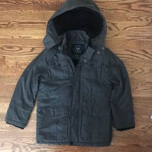 Boys size 10-12 medium jacket. Medium weight. Zipper detachable hood.